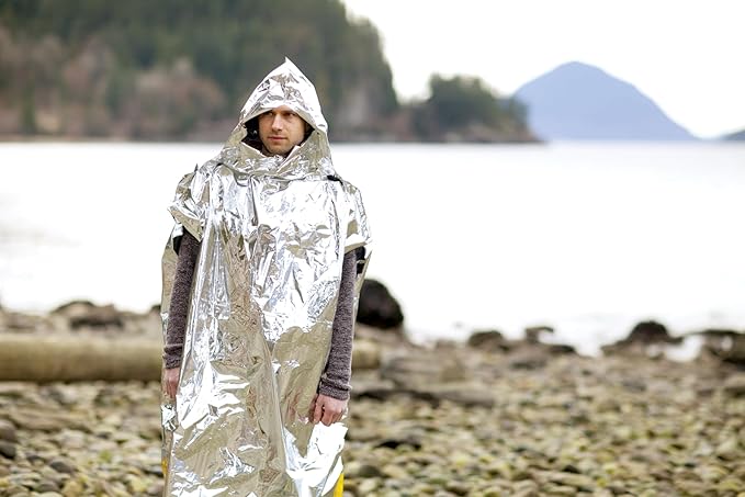 Coghlan's Emergency Survival Poncho – Lightweight Waterproof Heat Reflective Blanket for Camping, Hiking, and Outdoor Emergency Preparedness