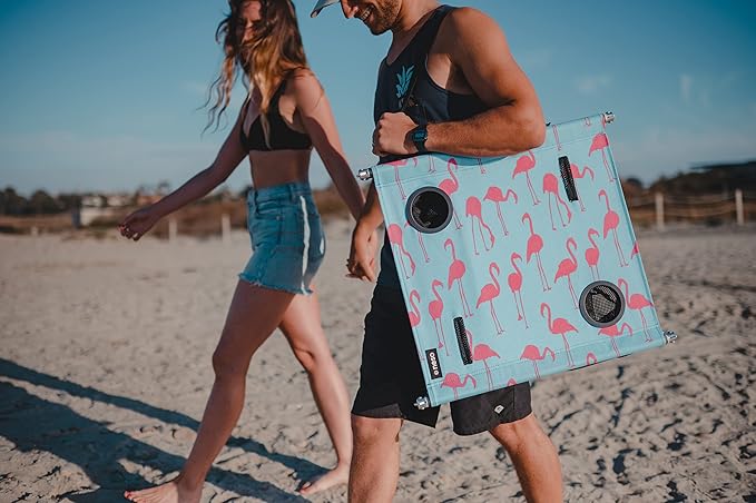 Neso Beach Table - Lightweight, Portable and Foldable Table for Beach, Camping and Outdoor Adventures - Stable Surface - with Cup Holder for Drinks and Phone Pockets - Flamingos