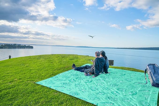 WEKAPO Beach Blanket Waterproof Sandproof Oversized, Extra Large Beach Mat Sand Free, Lightweight & Compact Sand Free Mat with 5 Stakes & 4 Corner Pockets