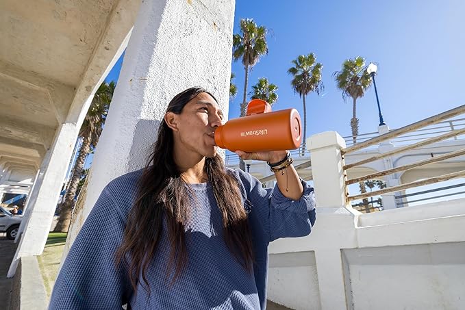 LifeStraw Go Series – Insulated Stainless Steel Water Filter Bottle for Travel and Everyday Use, Removes Bacteria, Parasites and Microplastics, Improves Taste, 1L Thistle Purple
