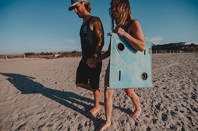 Neso Beach Table - Lightweight, Portable and Foldable Table for Beach, Camping and Outdoor Adventures - Stable Surface - with Cup Holder for Drinks and Phone Pockets - Aqua Fronds