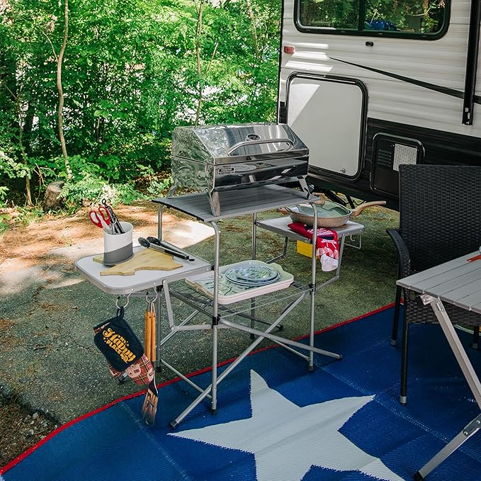Camco Olympian Deluxe Portable Grill Table - Provides Plenty of Room for Grilling Gear While Camping - Folding Grilling Table Collapses for Compact Storage - Supports Up to 100lb (57293)