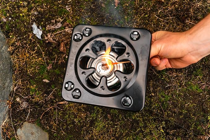 Coghlan’s Portable Folding Camp Stove – Compact, Lightweight Steel Cooking Stove for Camping, Backpacking, Hiking, or Emergency Use – Uses Canned Heat or Fuel Tablets, Black