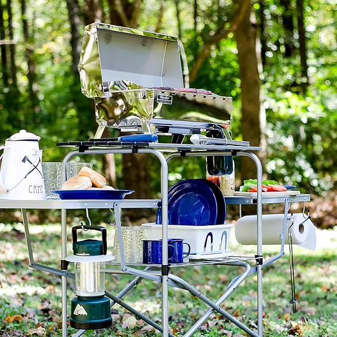 Camco Olympian Deluxe Portable Grill Table - Provides Plenty of Room for Grilling Gear While Camping - Folding Grilling Table Collapses for Compact Storage - Supports Up to 100lb (57293)